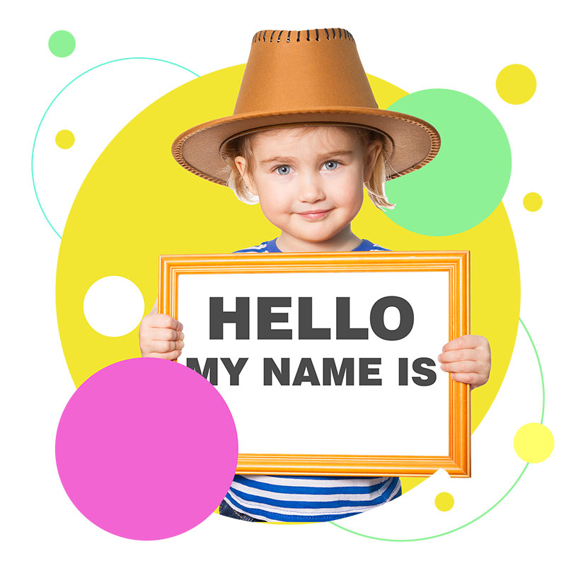 Photo of a preschool child holding up a personalized sign